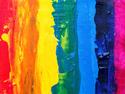 Rainbow stripes painted on canvas, representative of LGBTQ+ community