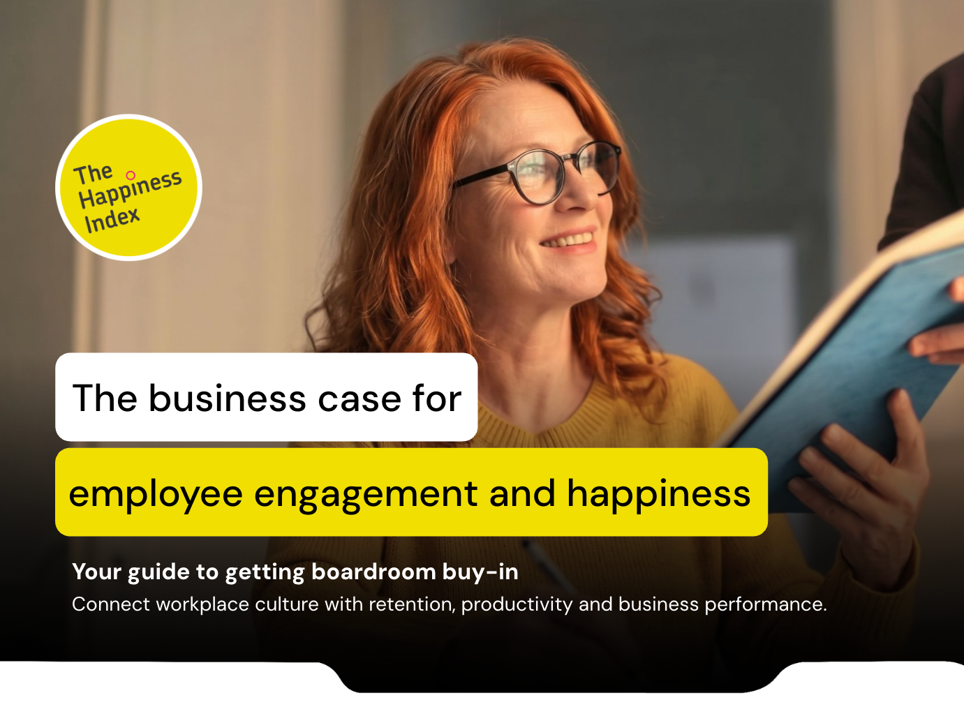 A business executive presenting a boardroom business case for employee happiness and engagement on a digital screen